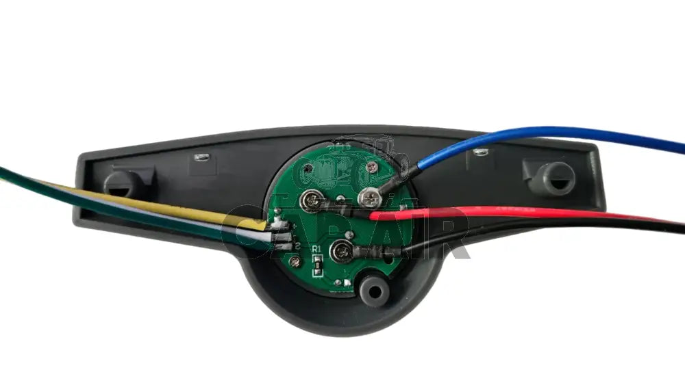 Close-up of electronic component with wires on a gray background